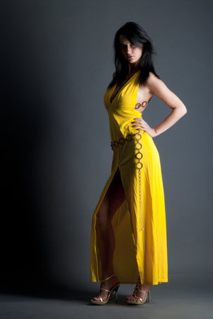 Beautiful lady in yellow dressの写真素材