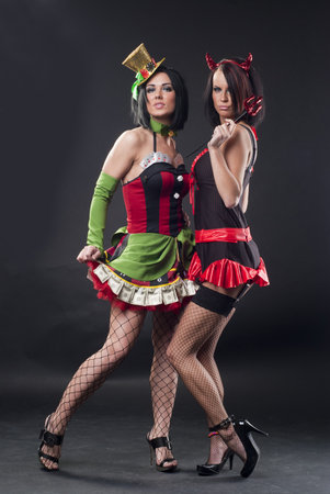Two sexy ladies in costumesの写真素材