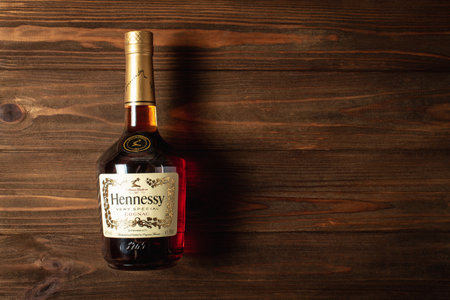 Ternopil, Ukraine - April 29, 2021: A bottle of Hennessy very special cognac on a wooden table. copy spaceのeditorial素材