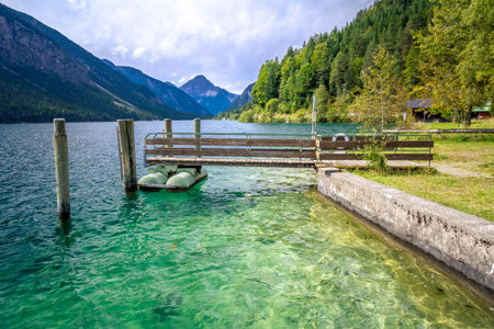Lake Plansee. Austria. Pier on a mountain lakeの写真素材