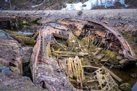 Old rusty rotten boat on Teriberka. Russian northの写真素材