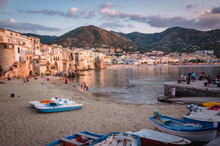 Cefalu, Sicily - October 10 2019: View over Cefalu bay on italian island Sicily with lots of people on the beachのeditorial素材