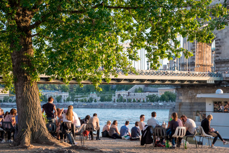 BUDAPEST, HUNGARY - MAY 02: Floating Restaurants at River Danube in Budapest. Popular place. Youth...