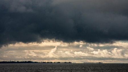 thundercloud over the sea. Kronshtadt, Russiaの写真素材