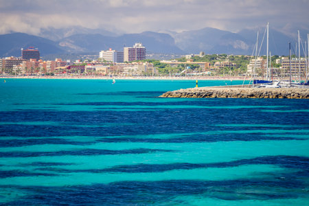 Colorful summer landscape with bay, boat, blue water, sky. Balearic islands Mallorca. View on Palma de Mallorcaの写真素材