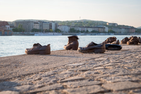 The Shoes on the Danube Bank monument in Budapest. Iron shoes memorial to Jewish people executed World Warのeditorial素材