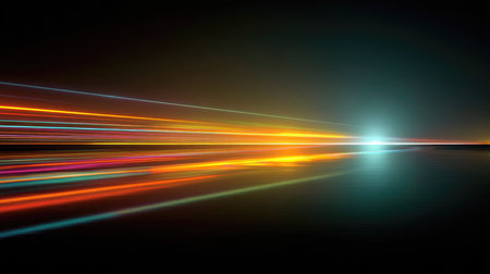 This captivating image features vibrant light trails on a smooth surface, set against a dramatic black background, evoking a sense of motion and energy.の素材