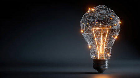 An imaginative depiction of a light bulb created with a wireframe design glowing with interconnected lights, symbolizing innovation, ideas, and creativity.の素材