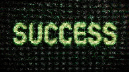 A captivating digital close-up of the word 'success' highlighted in green on a textured screen, symbolizing achievement and motivation in a modern context.の素材