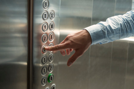 Pressing the button in the elevatorの写真素材