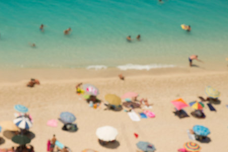 Sunny summer day at the beach, people enjoying the summer vacationの写真素材