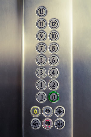 Different buttons in modern metal elevator   の写真素材