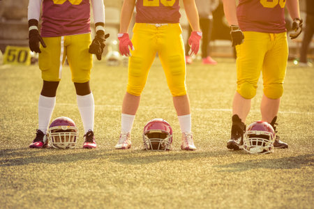 American football players on the field. Match is about to start.の写真素材