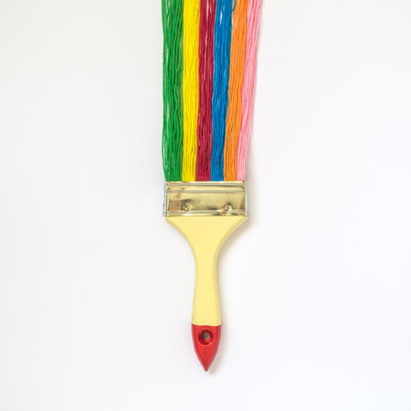 Paint brush with colorful strings minimal creative concept.の写真素材