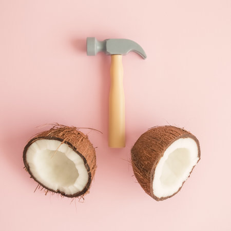 Coconut breaking minimal creative concept.