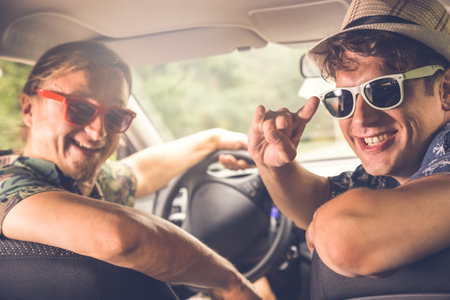 Two hipster friends on road trip.の写真素材