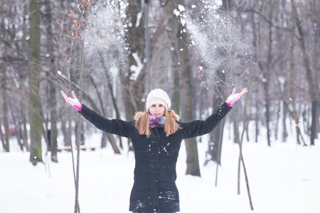 Young female enjoying winter.