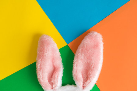 Bunny ears against colorful background minimal easter creative concept.の写真素材