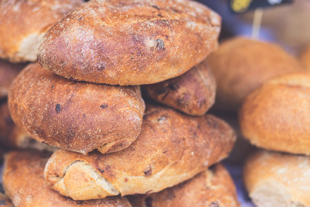 Baked loaves of bread close up.の写真素材