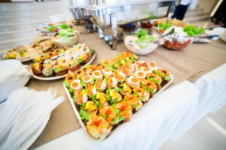Appetizer canape with shrimp and mussels on buffet table.