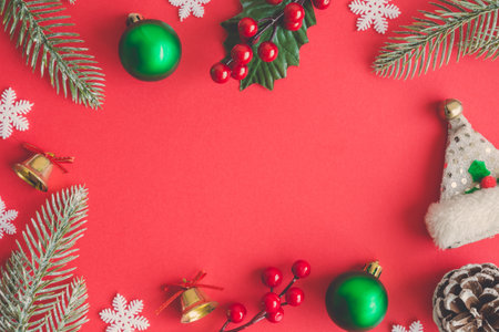 Christmas composition decoration on red background. Space for copy.