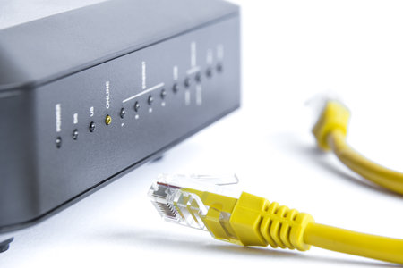 Close up of home modem with network cable. Internet, wlan and mobile connections.の写真素材