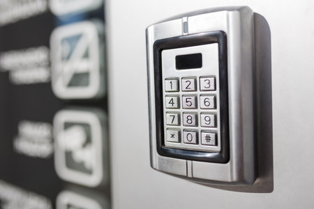 Close up of modern home security keypad access panel.の写真素材