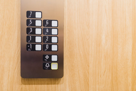 Close up of elevator control panel buttons. Space for copy.の写真素材