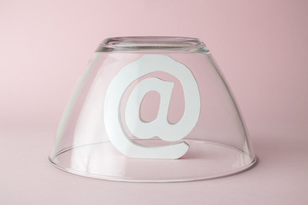 Work from home concept made of email symbol under glass cover. Coronavirus quarantine working online.の写真素材