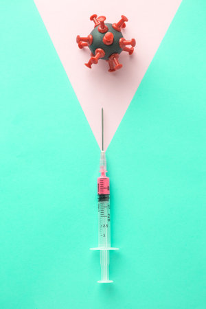 Coronavirus covid-19 cure abstract made of syringe and virus cell.の写真素材