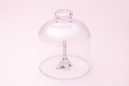Eiffel Tower under glass cover, France fight against corona virus isolation quarantine minimal creative concept.の写真素材