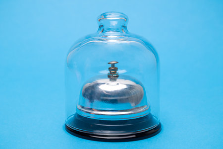 Hotel reception bell in quarantine minimal creative coronavirus concept.の写真素材