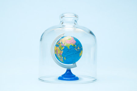 Earth globe in quarantine minimal creative coronavirus epidemic danger concept.の写真素材