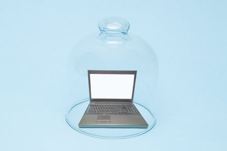Blank screen laptop in quarantine minimal creative work from home due coronavirus pandemic concept.の写真素材