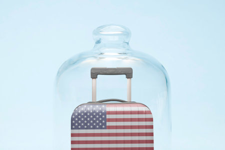 Suitcase with united states flag design in quarantine minimal creative coronavirus travel restriction concept.の写真素材