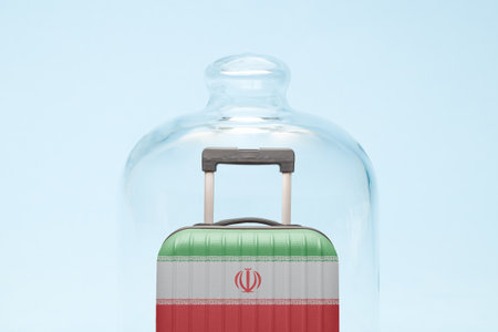 Suitcase with Iranian flag design in quarantine minimal creative coronavirus travel restriction concept.の写真素材