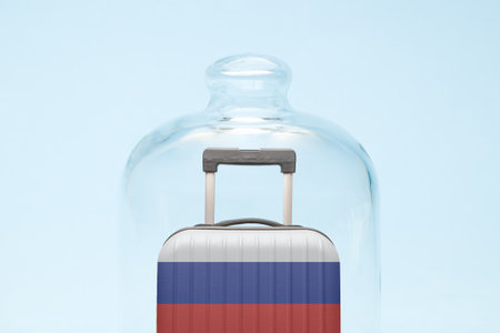 Suitcase with Russian flag design in quarantine minimal creative coronavirus travel restriction concept.の写真素材
