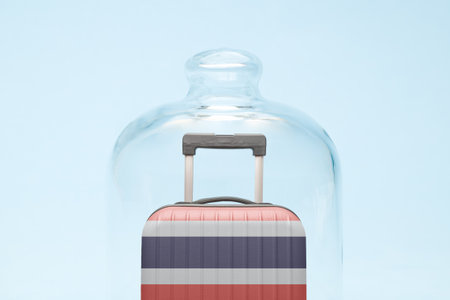 Suitcase with Thai flag design in quarantine minimal creative coronavirus travel restriction concept.の写真素材