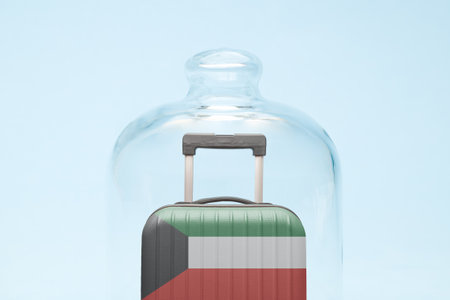 Suitcase with Kuwaiti flag design in quarantine minimal creative coronavirus travel restriction concept.の写真素材