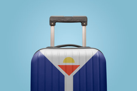 Suitcase with Saint Martin flag design travel Caribbean America concept.の写真素材