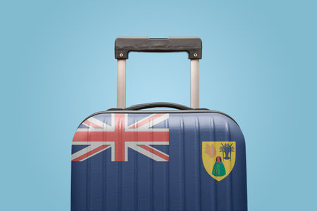 Suitcase with Turks and Caicos Islands flag design travel Caribbean America concept.の写真素材