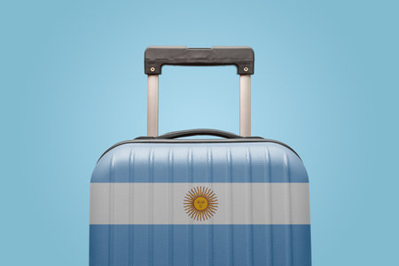 Suitcase with Argentinian flag design travel South America concept.の写真素材