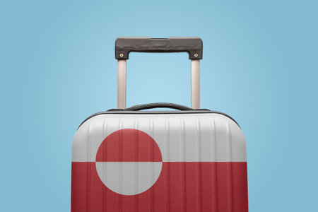 Suitcase with Greenland flag design travel America concept.の写真素材