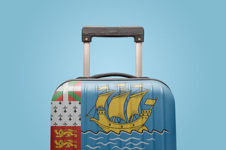 Suitcase with Saint Pierre & Miquelon flag design travel America concept.の写真素材