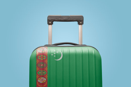 Suitcase with Turkmenistan flag design travel Asia concept.の写真素材