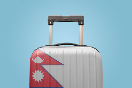 Suitcase with Nepali flag design travel Asia concept.の写真素材