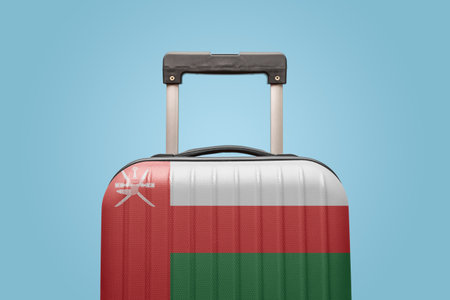 Suitcase with Omani flag design travel Asia concept.の写真素材