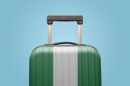 Suitcase with Nigerian flag design travel Africa concept.の写真素材