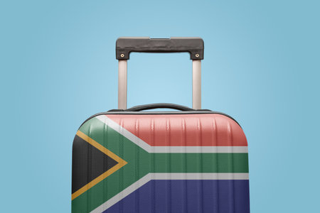 Suitcase with South African flag design travel Africa concept.の写真素材