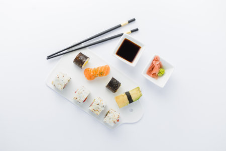 Flat lay of of japanese sushi set on white background. Space for copy.の写真素材